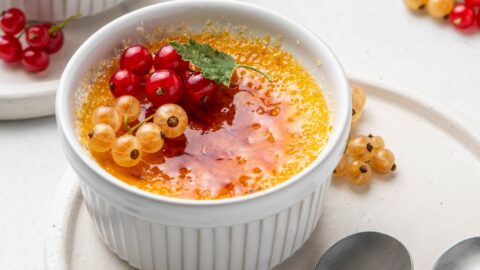 Homemade Creme Brulee in Ramekin with Decorated Berries