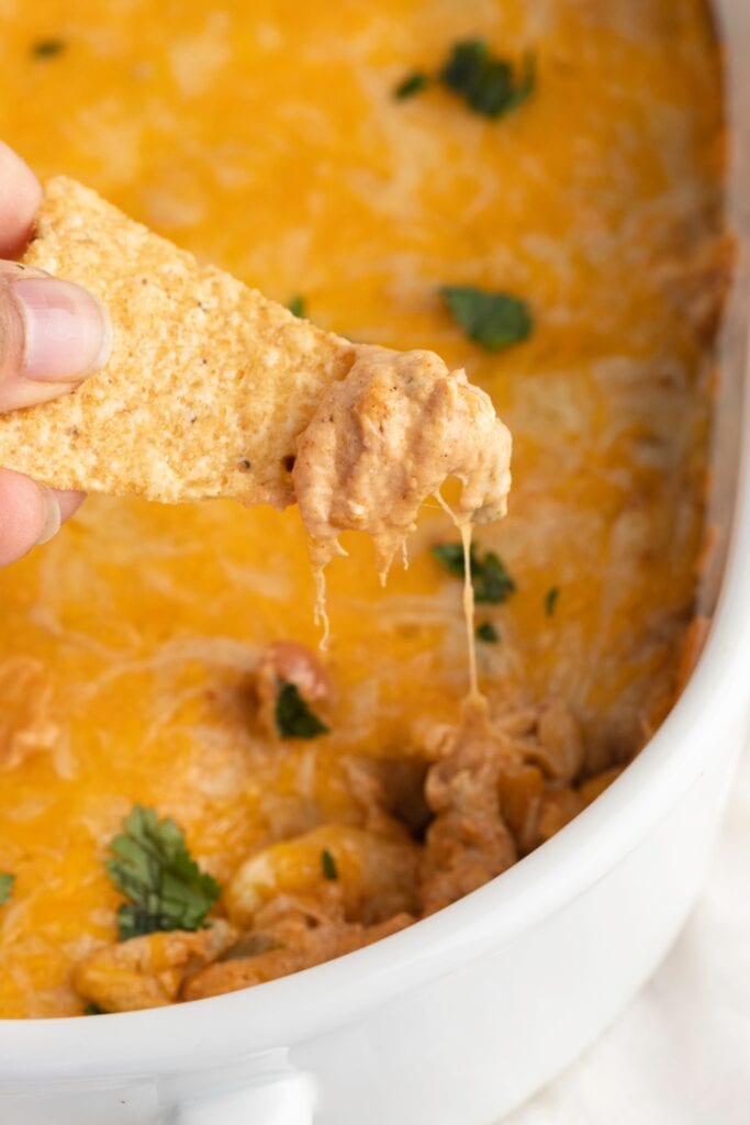 Close up Of a Chip Scooping Texas Trash Dip 