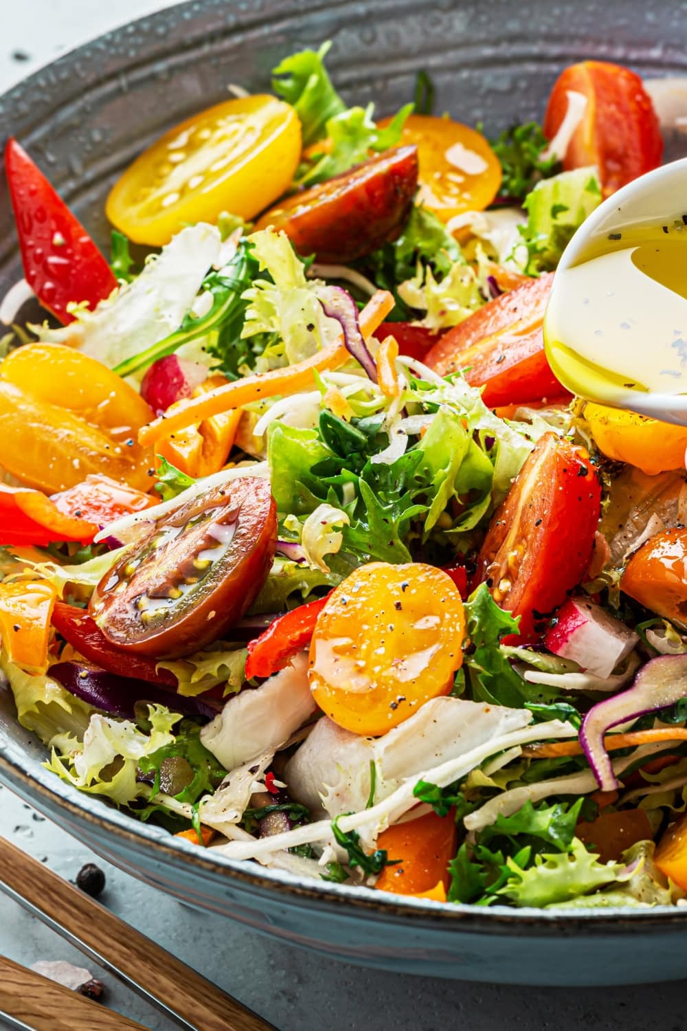 Homemade Vegetable Salad with Red and Yellow Cherry Tomatoes and Olive Oil
