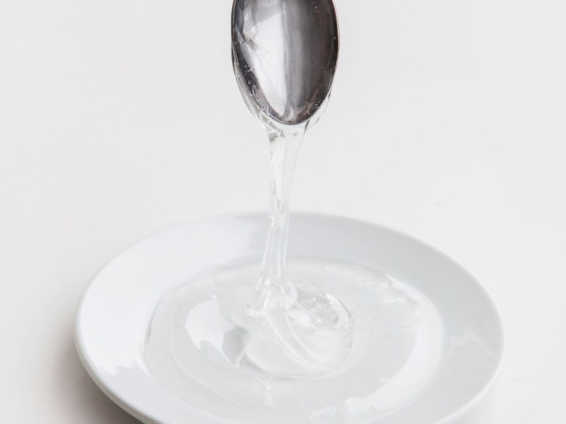 Light Corn Syrup Poured in a White Saucer