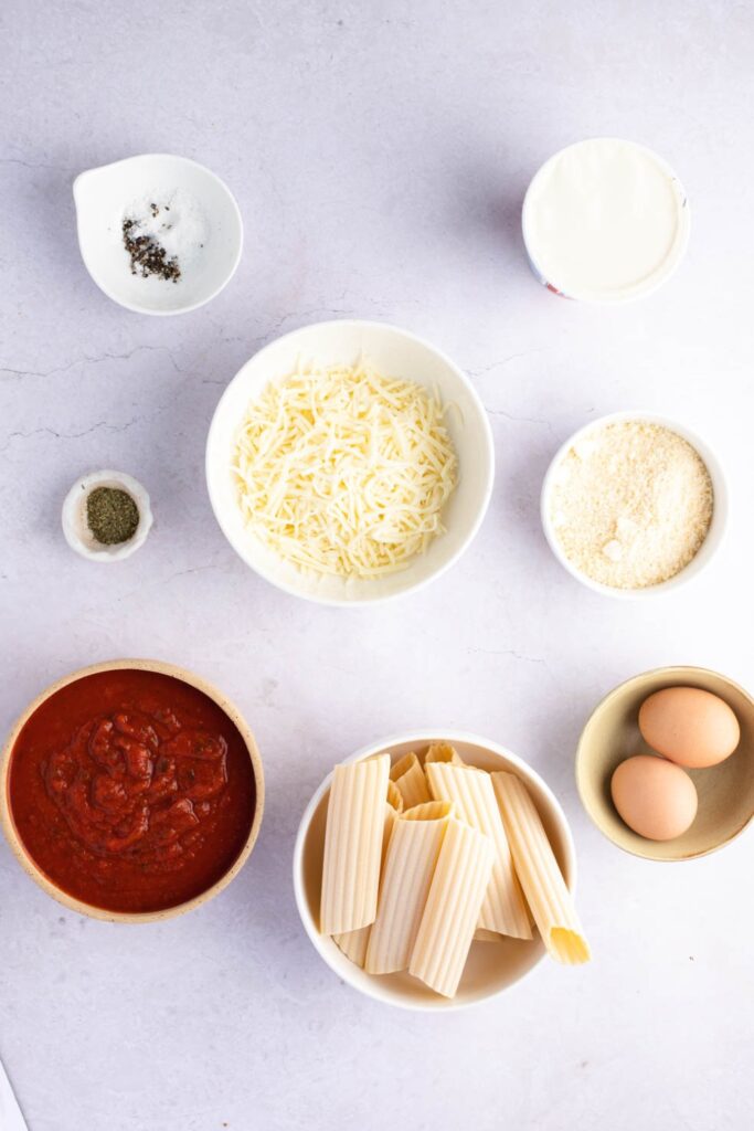 Manicotti Ingredients - Manicotti, Ricotta, Mozzarella, Parmesan, Eggs, Parsley, Salt, Pepper and Spaghetti Sauce
