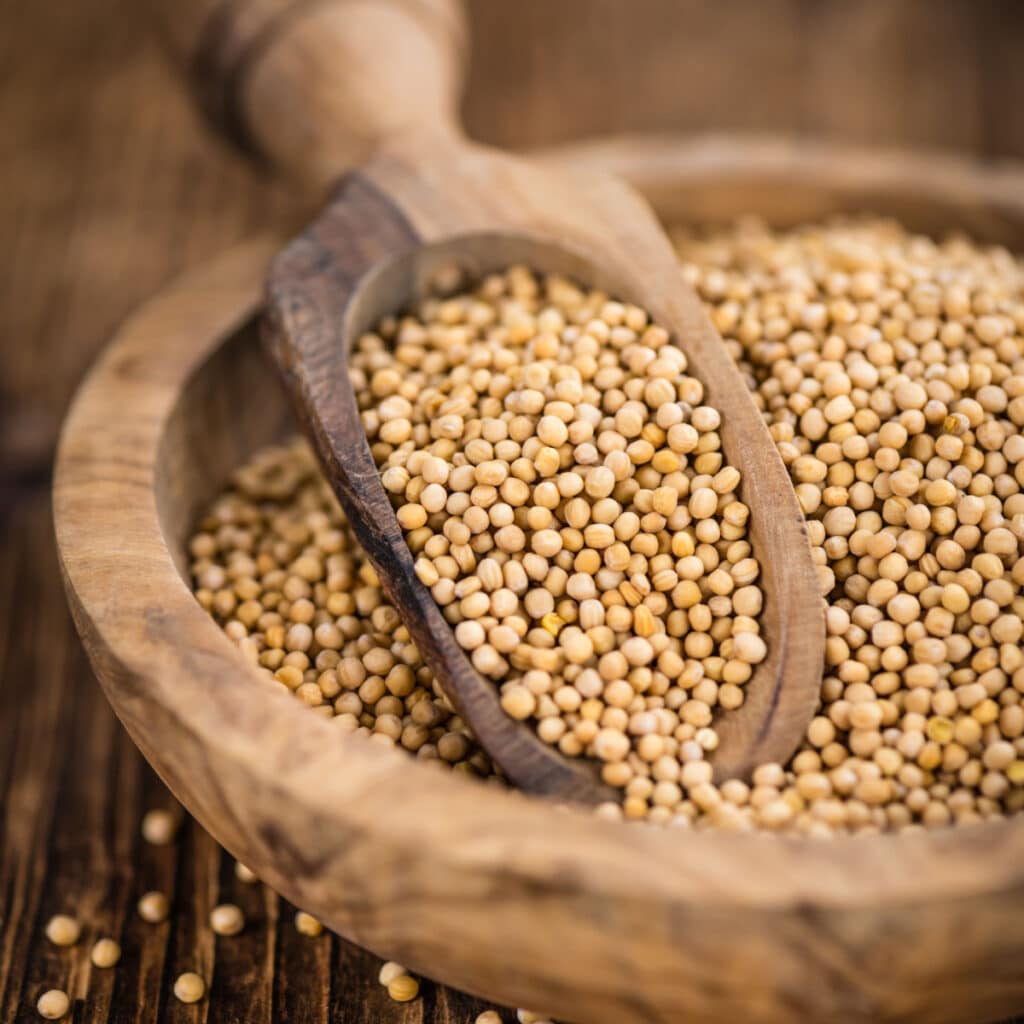 Mustard Seeds on a Wooden Bowl