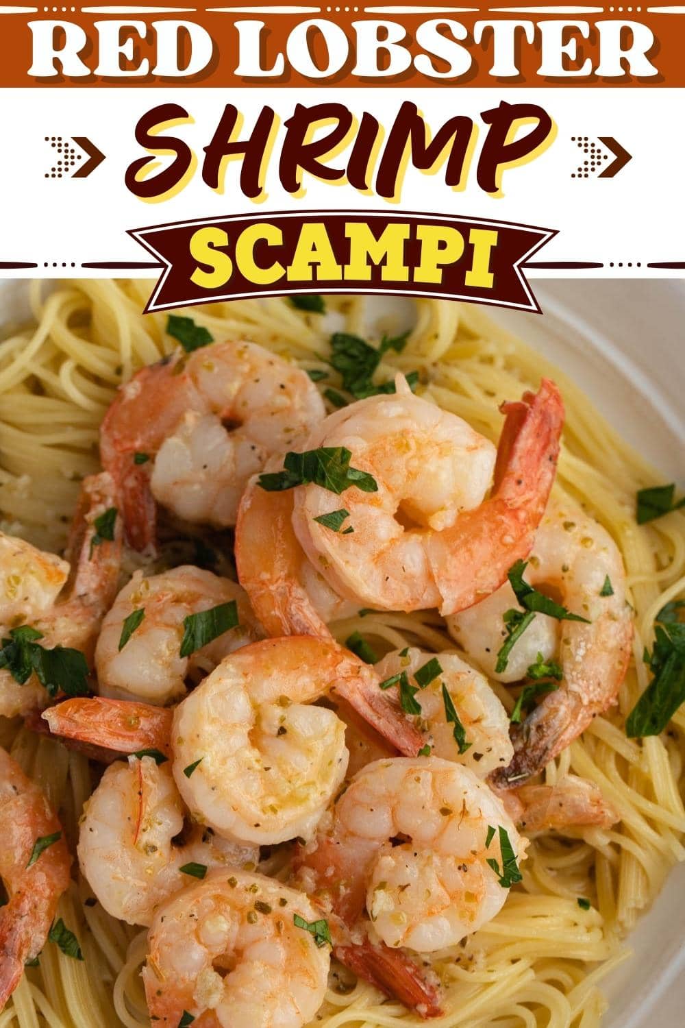 Pasta Topped With Red Lobster Shrimp Scampi, Garnished With Chopped Parsley Leaves