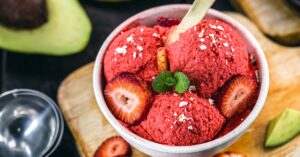Sweet Homemade Strawberry Ice Cream in a White Bowl