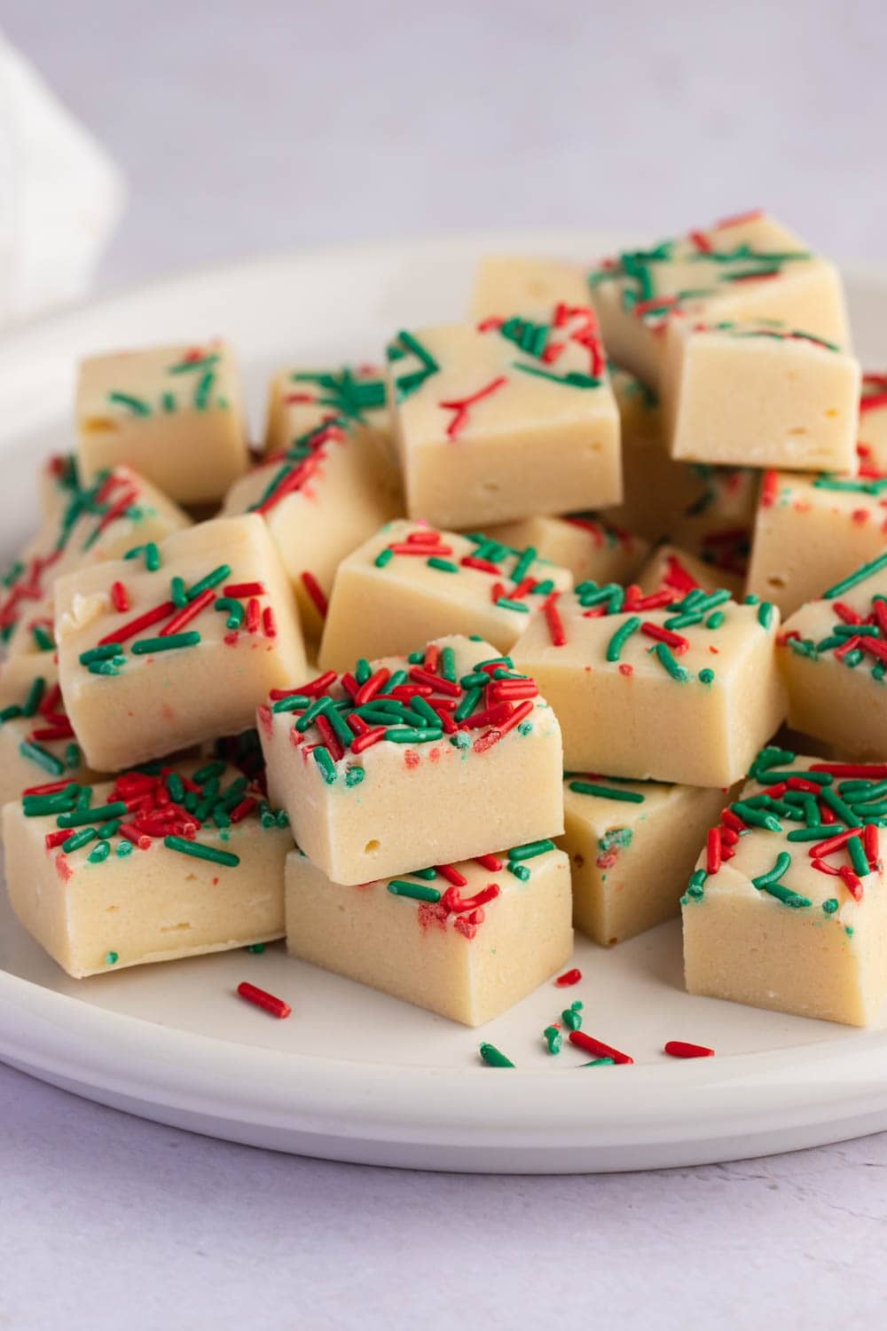 Sweet and Classic Christmas Cookie Fudge Served on a White Plate