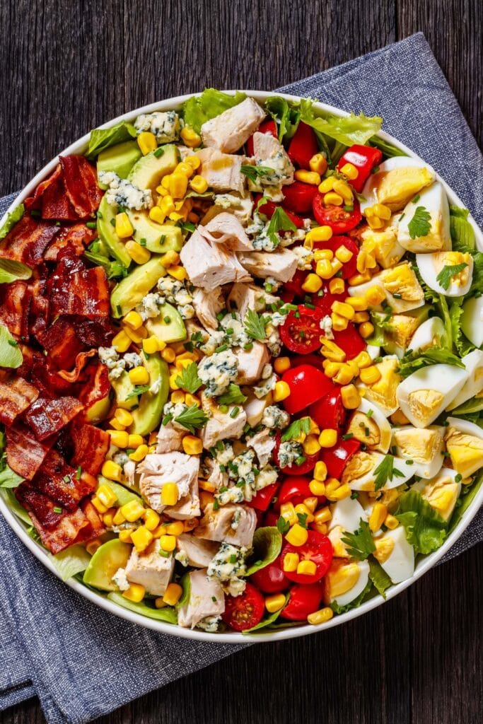 American Salad with Chicken, Corn, Egg, Tomatoes and Bacon