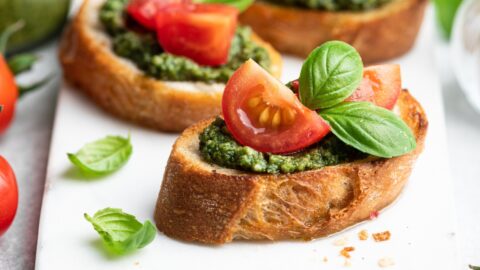 Appetizing Bruschetta with Pesto, Tomatoes and Basil