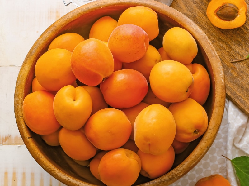 Wooden Bowl Full of Fresh Apricots