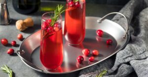 Boozy Poinsettia Cocktail with Cranberry and Prosecco