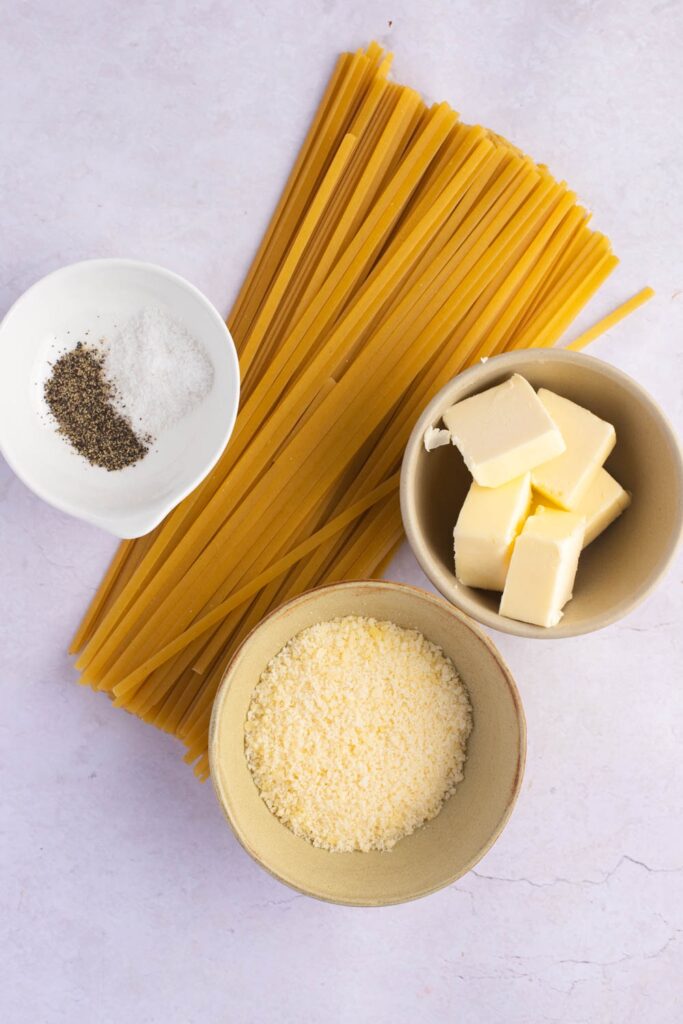 Buttered Noodle Ingredients - Fettucine Noodles, Butter, Grated Parmesan Cheese, Salt and Pepper