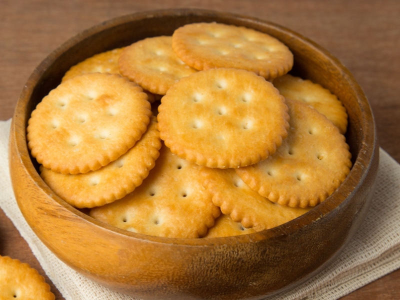 Bunch of Crackers in a Wooden Bowl