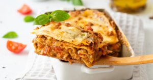 Homemade Creamy Noodle Lasagna with Meat and Cheese in a Casserole