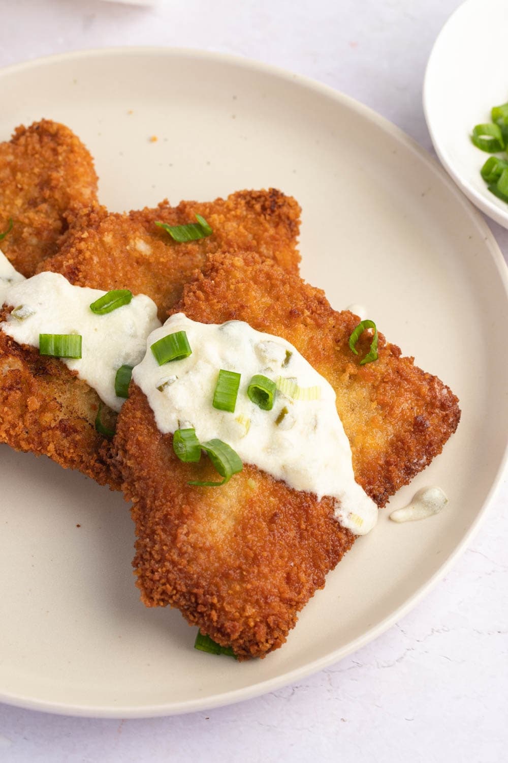 Homemade Crispy Pork Cutlet with Sour Cream and Green Onions