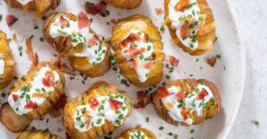 Homemade Stuffed Baked Potato with Bacon, Sour Cream and Herbs