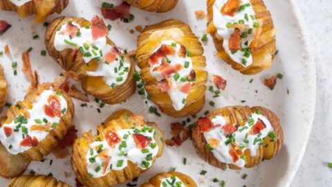 Homemade Stuffed Baked Potato with Bacon, Sour Cream and Herbs