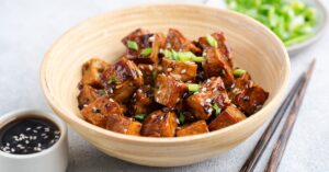 Homemade Tofu Cubes with Soy Sauce, Sesame Seeds and Green Onions
