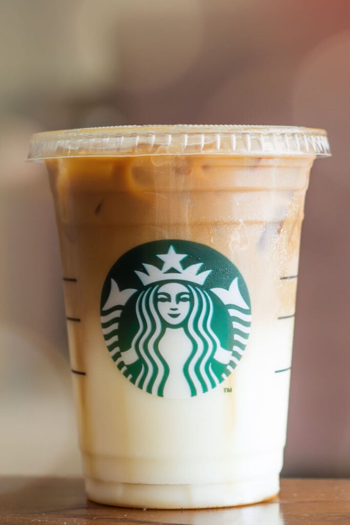Iced Caramel Macchiato in a Cup with Lid