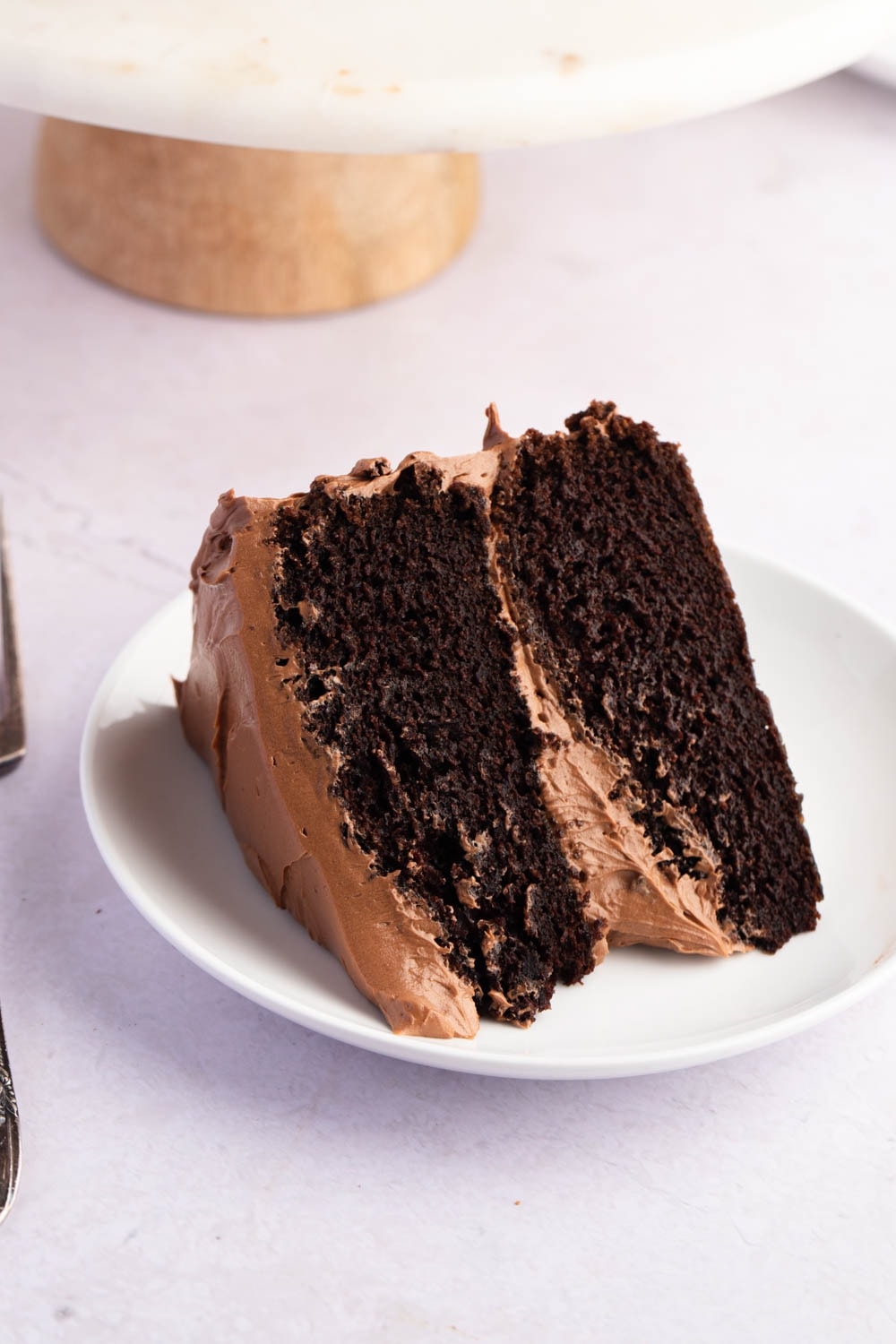 A Sliced of Ina Garten's Chocolate Cake,   With Chocolate Buttercream Filling and Frosting
