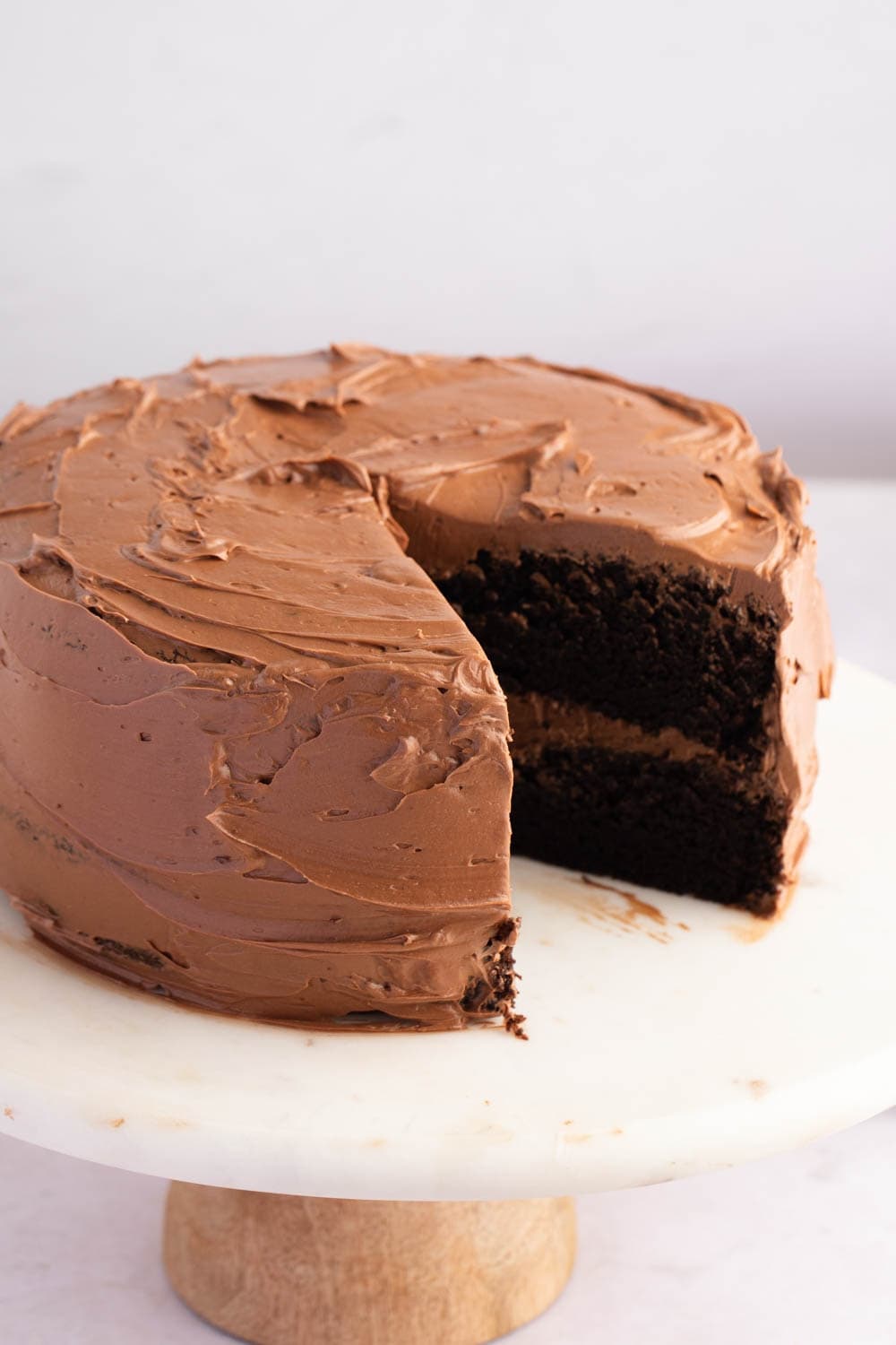 Moist, Rich and Chocolatey Whole Chocolate Cake, With a Slice Take Out, Served on a Cake Tray 