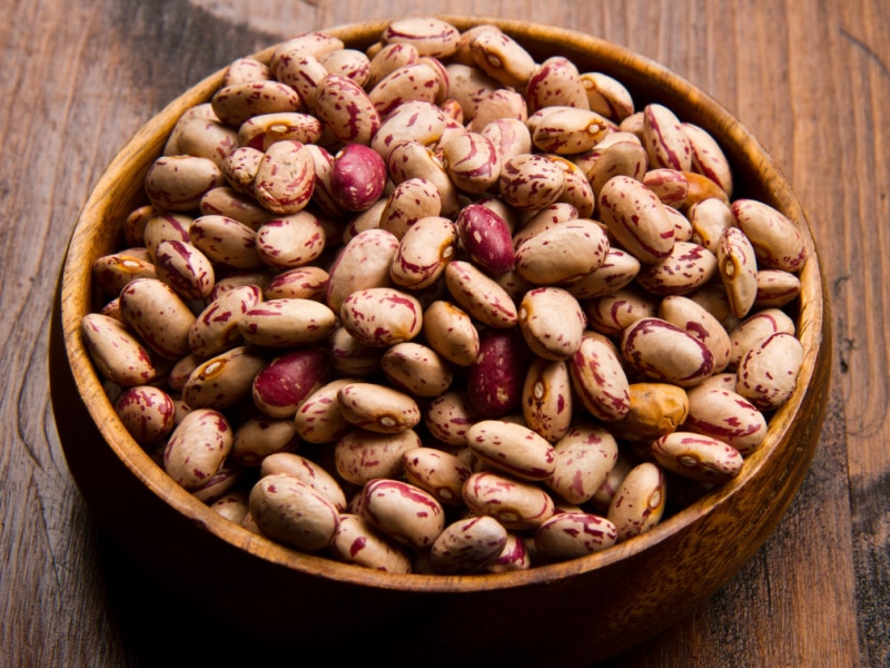 Raw Pinto Beans in a Wooden Bowl