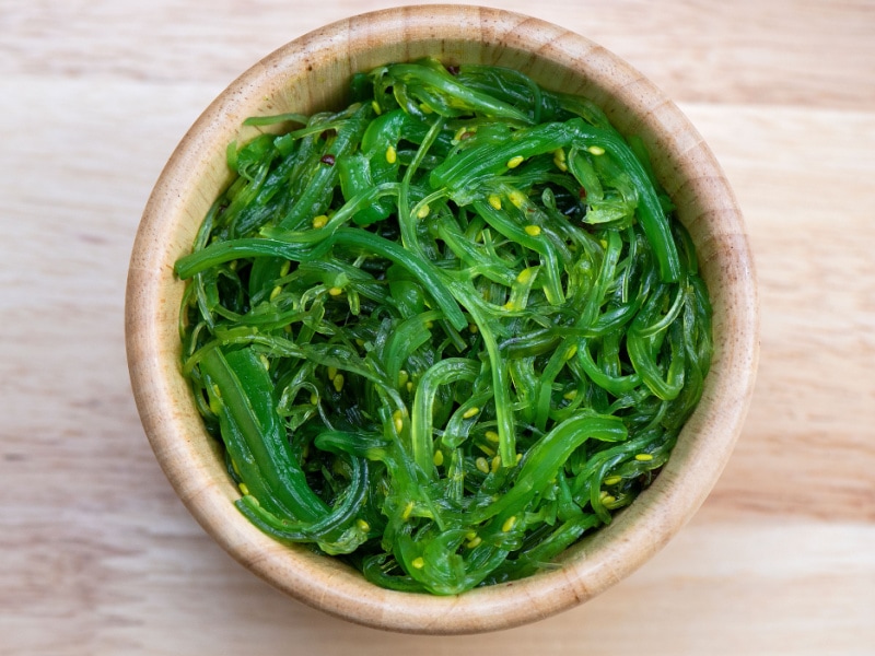 Fresh Slices of Seaweeds in a Wooden Bowl