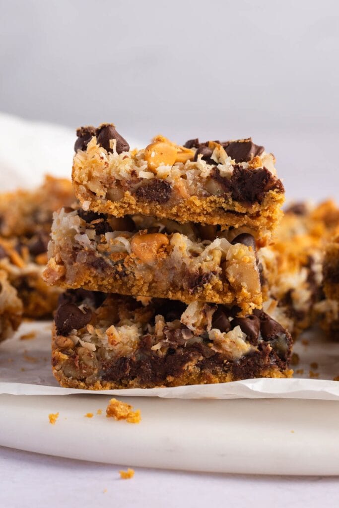 Seven Layer Bars Stacked with Coconut, Chocolate and Butterscotch Chips