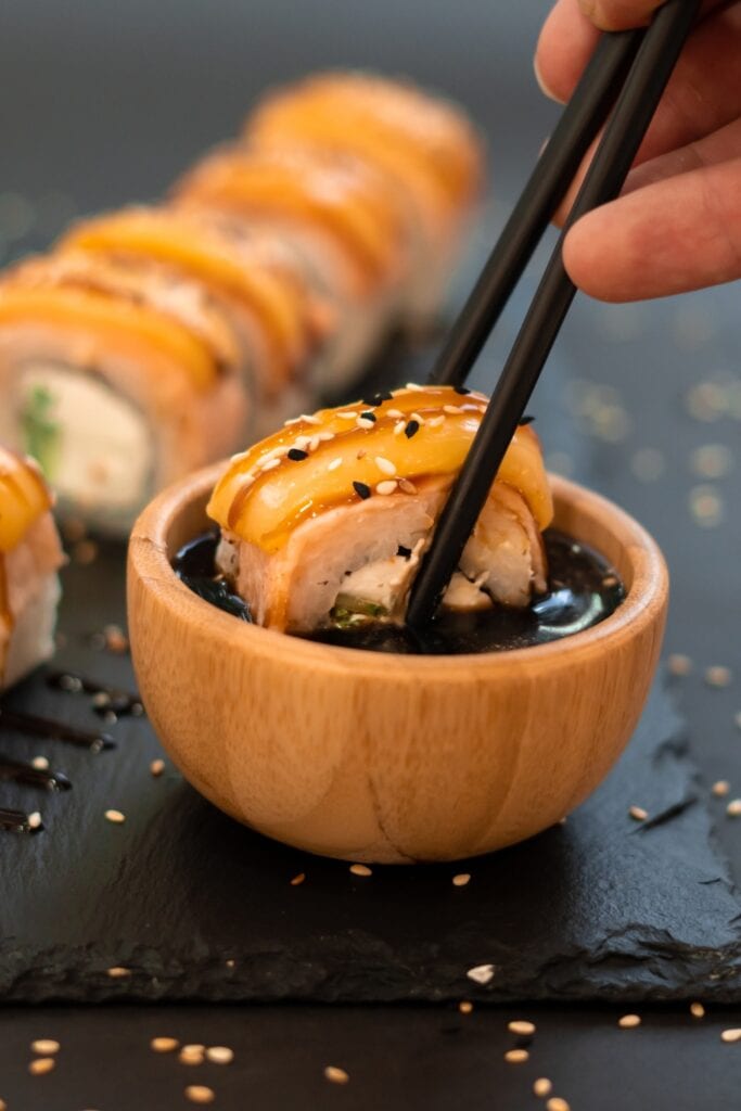 Sushi Roll with Cream Cheese and Salmon in a Dipping Sauce