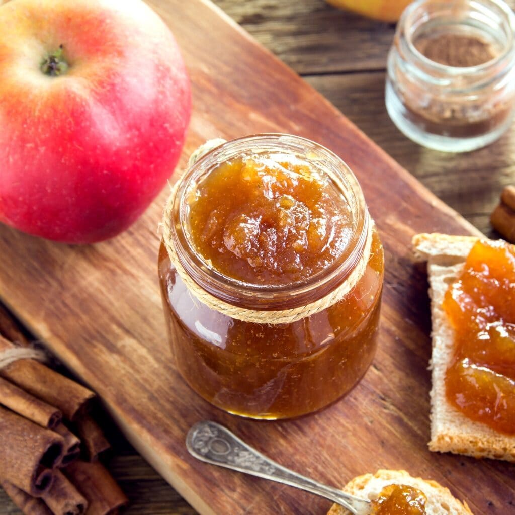 Apple Butter in a Glass Jar with Bread