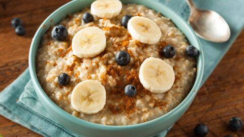 Bowl of Homemade Steel Cut Oatmeal with Fruits and Cinnamon