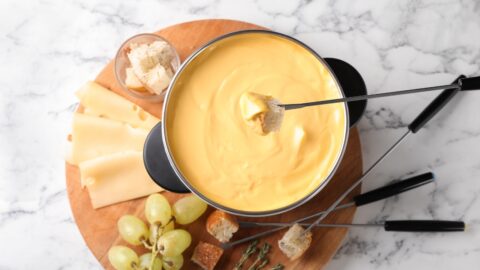 Cheese Fondue Dip with Fresh Grapes and Bread
