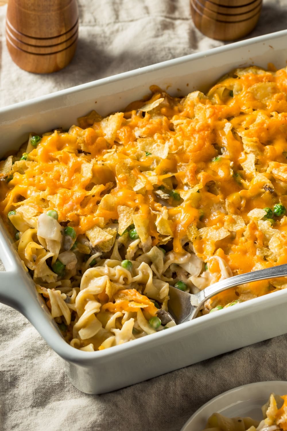 Savory Chicken Noodle Casserole Loaded With Veggies And Topped With Crispy Bacon Bits.