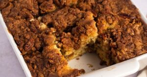 Christmas Coffee Cake in a White Casserole with Pecan Nuts and Cinnamon