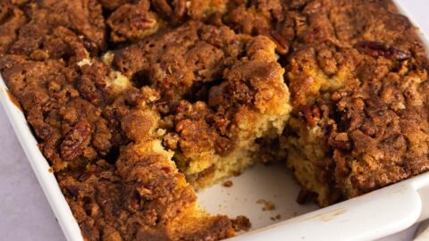 Christmas Coffee Cake in a White Casserole with Pecan Nuts and Cinnamon