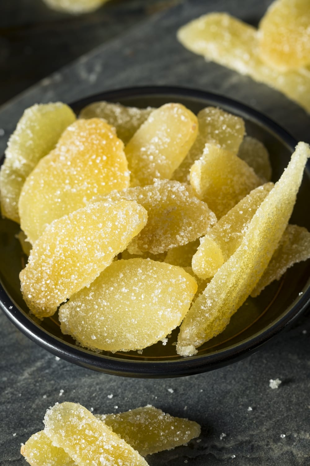 Crystalized Ginger Coated with White Sugar in a Small Container