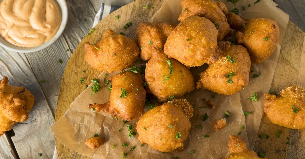 Deep Fried Hush Puppies with Sauce and Herbs