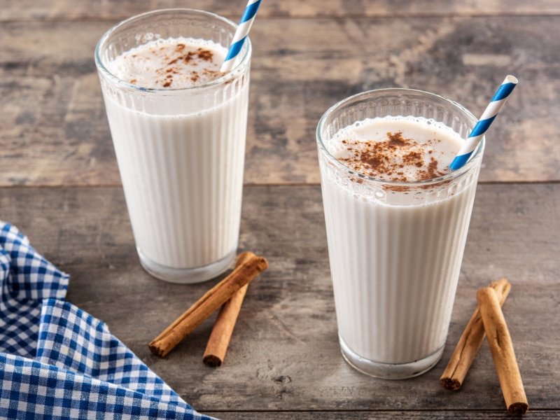 Horchata and Cinnamon Bark on a Wooden Table