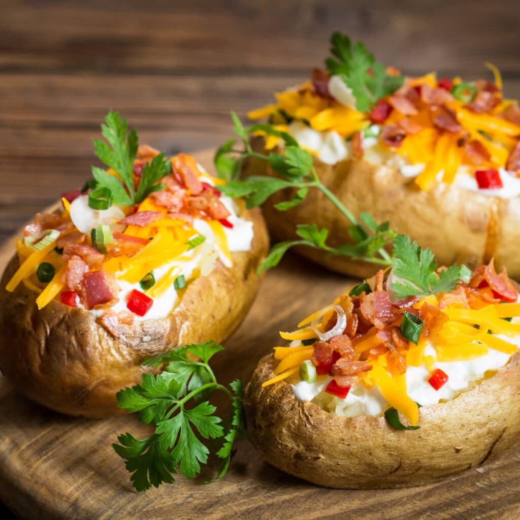Cheesy Microwave Baked Potatoes With Lots of Toppings