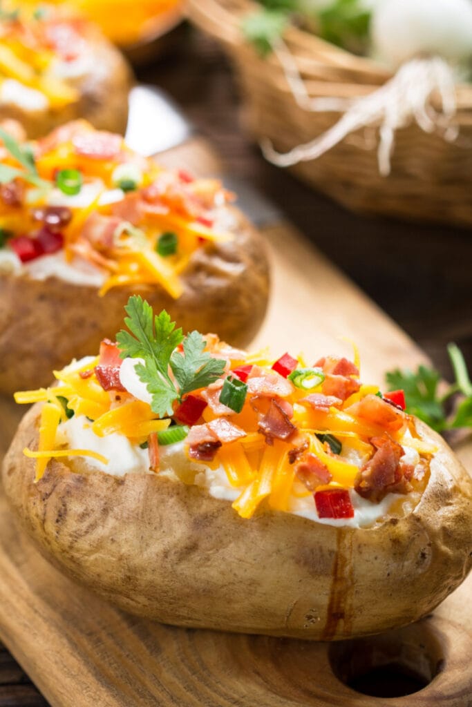 Microwave Baked Potatoes Topped With Cheese and Bacon