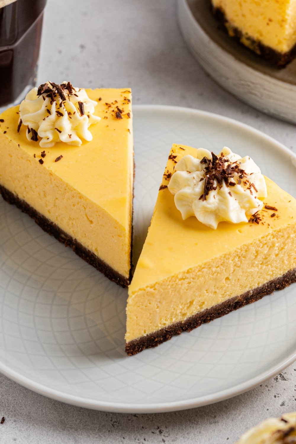Two Slices of No-Bake Pumpkin Cheesecake with Crushed Chocolate Crush