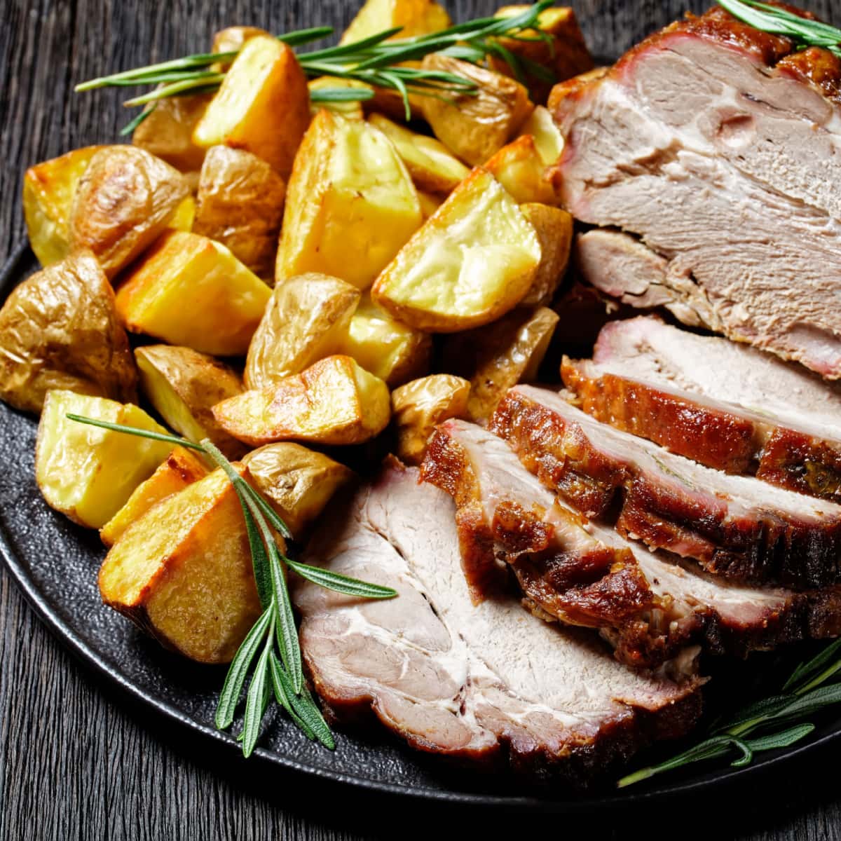 Pork Meat Slices with Rosemary Roasted Potatoes on Sides