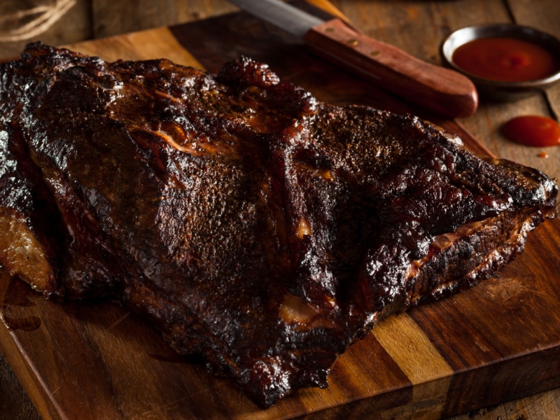 Smoked Barbeque Beef Brisket on a Wooden Cutting Board
