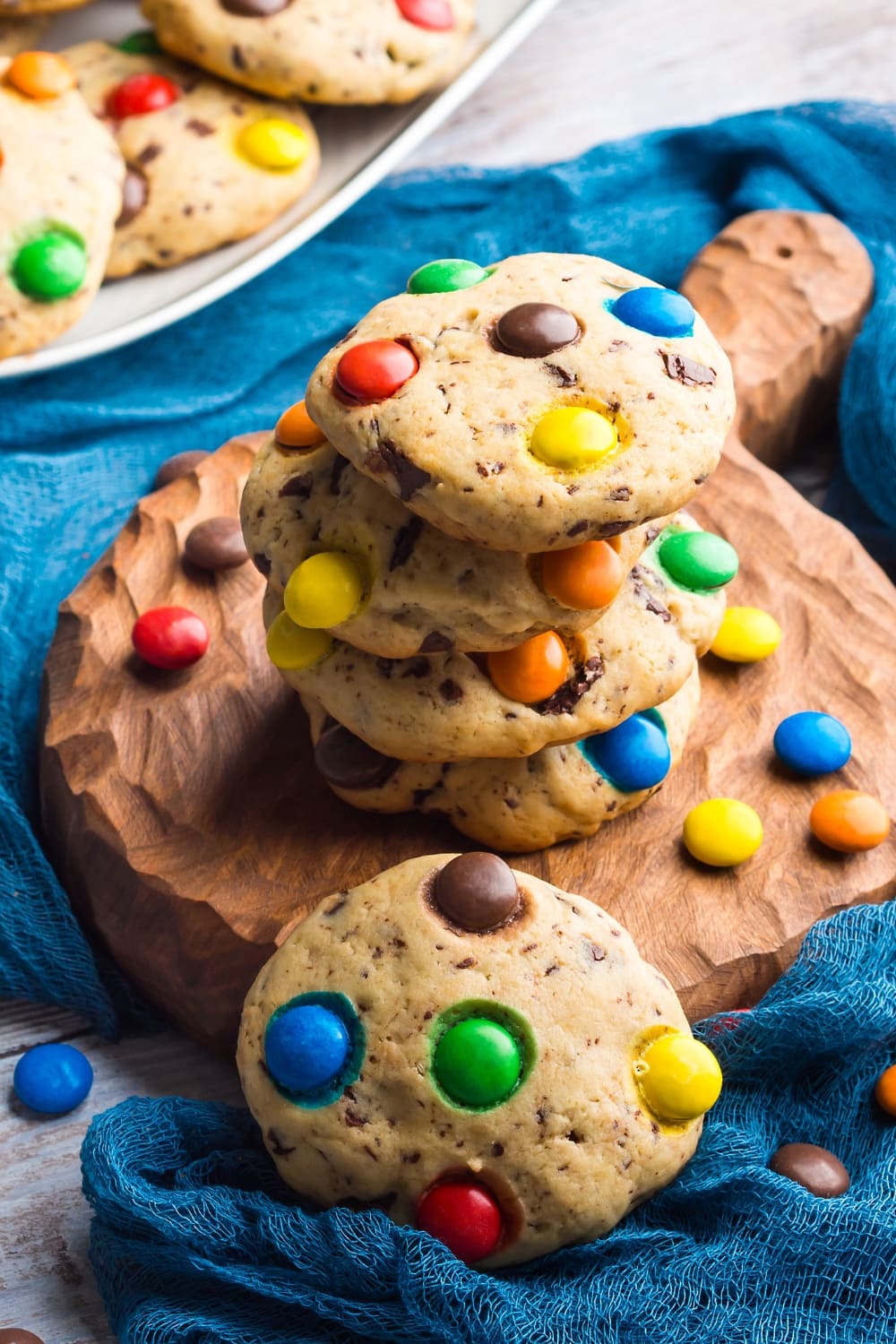 M&M Cookies on a Baking Sheet and Wooden Board