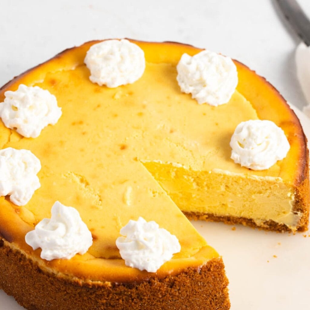 Sweet and Tangy Lemon Cheesecake with Heavy Whipped Cream