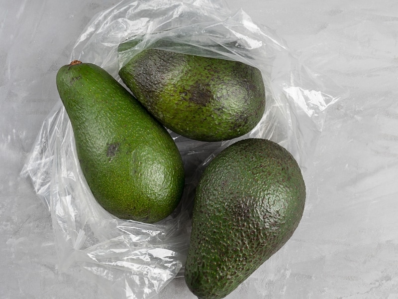 Whole Avocados on a Plastic Bag