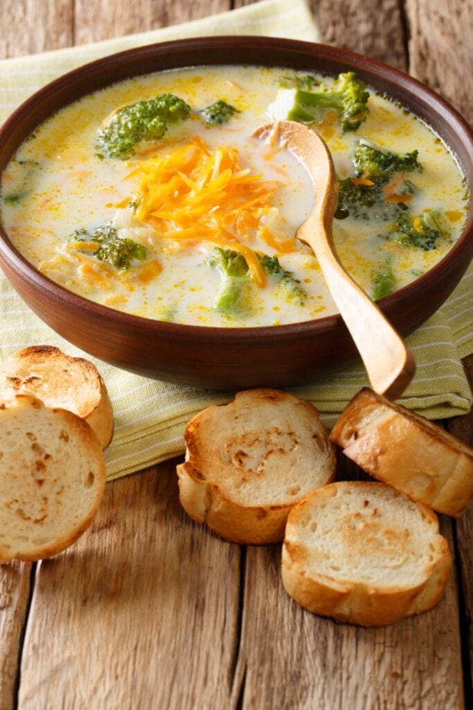 Broccoli Cheese Soup in a Bowl with Bread
