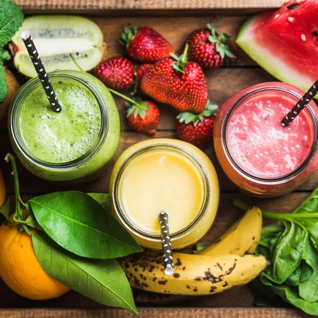 Cold Refreshing Fruit Smoothies with Kiwi, Banana and Strawberries