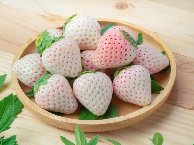 White Strawberries on a Wooden Tray
