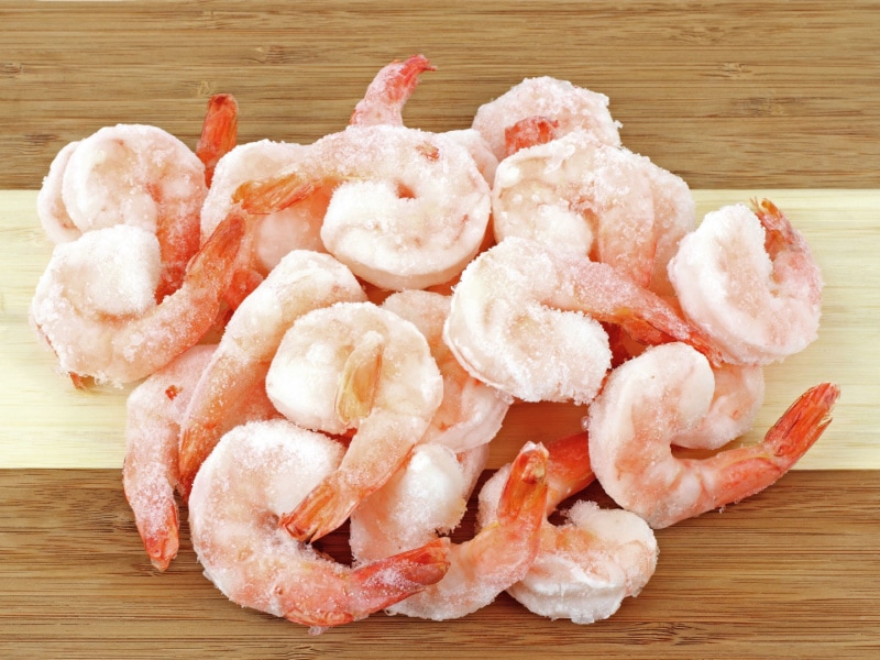 Frozen Cooked Shrimps on a Table