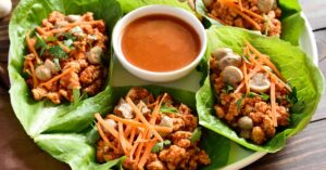 Healthy Asian Minced Meat Lettuce Wraps with Carrots and Sauce