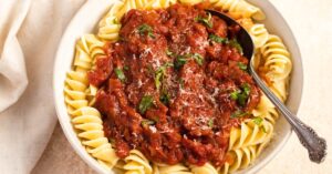 Homemade Bowl of Arrabbiata Sauce with Noodles and Herbs